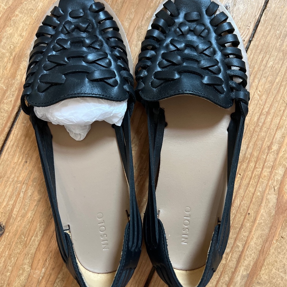 Black woven sandals from Nisolo